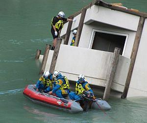 Japan rescuers search mudslide for typhoon survivors