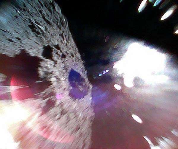 Asteroid Ryugu shaken by Hayabusa2's impactor