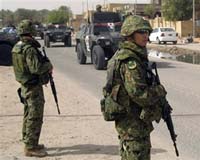 Japan's ruling party backs smaller Afghan mission