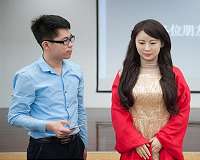 Bionic woman: Chinese robot turns on the charm