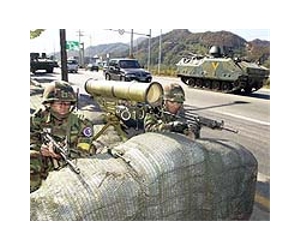 North Korean troops fire at South Korea army post: military