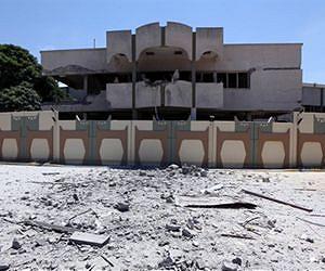 Libya says NATO warplanes raid port, Kadhafi home in Tripoli