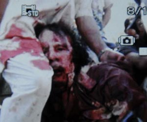 Kadhafi captured then shot dead
