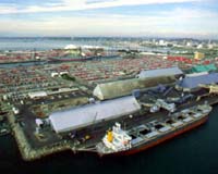 Rising exports push down US trade gap; China, oil deficit still high
