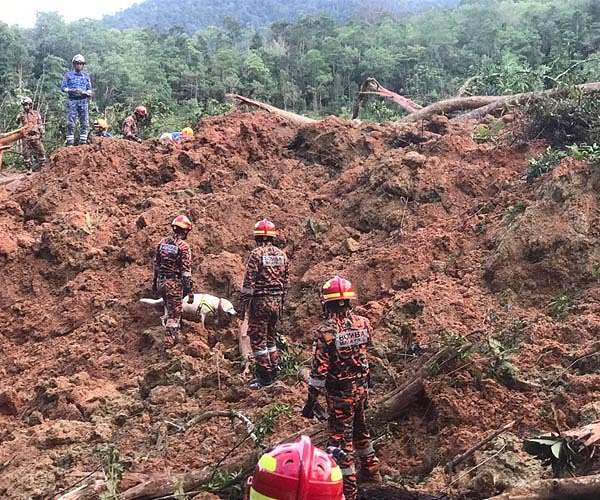Indonesia digs out as flooding, landslide death toll hits 20