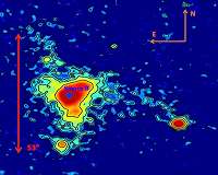 Vast Luminous Nebula Poses a Cosmic Mystery