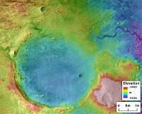 Overflowing crater lakes carved canyons across Mars