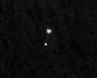 Camera On Mars Orbiter Snaps Phoenix During Landing