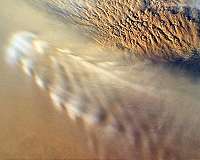 Waves in thin Martian air with wide effects