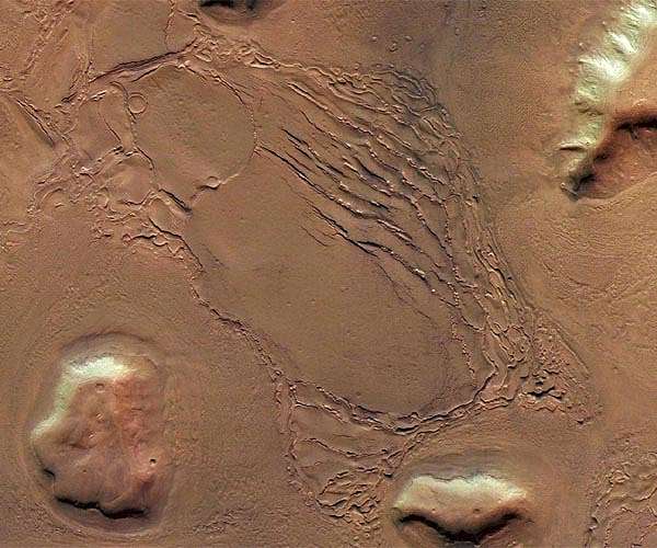 Rocky road geology reveals billion year story inside Martian crater