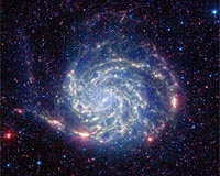 Spitzer Reveals No Organics Zone Around Pinwheel Galaxy