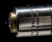 Generating broadband terahertz radiation from a microplasma in air