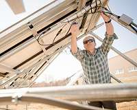 Installing solar to combat national security risks in the power grid