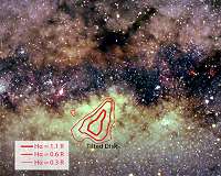 Peering under dust, study reveals radiation at galactic center