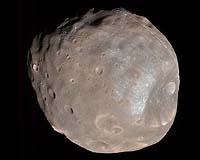 NASA Spacecraft Images Mars Moon In Color And In 3D