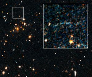 NASA's Hubble Spots Rare Gravitational Arc from Distant, Hefty Galaxy Cluster
