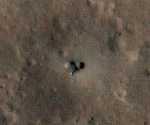NASA Mars Orbiter captures dust-covered InSight Lander