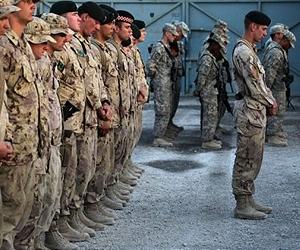 NATO launches into new era under Afghan cloud