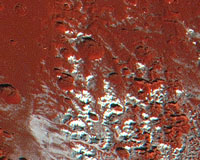 Methane Snow on Pluto's Peaks