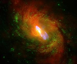 How Black Holes May Shape Galaxies
