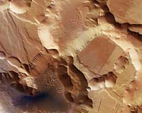 Trough Deposits On Mars Point To Complex Hydrologic Past