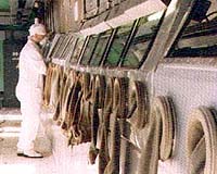Iran wants nuclear fuel guarantees, warns against air attack