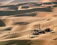 Riyadh holds to oil line, prices drop further