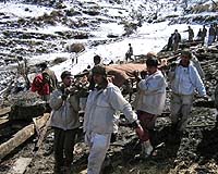 Pakistan ends search for 23 people trapped by landslide
