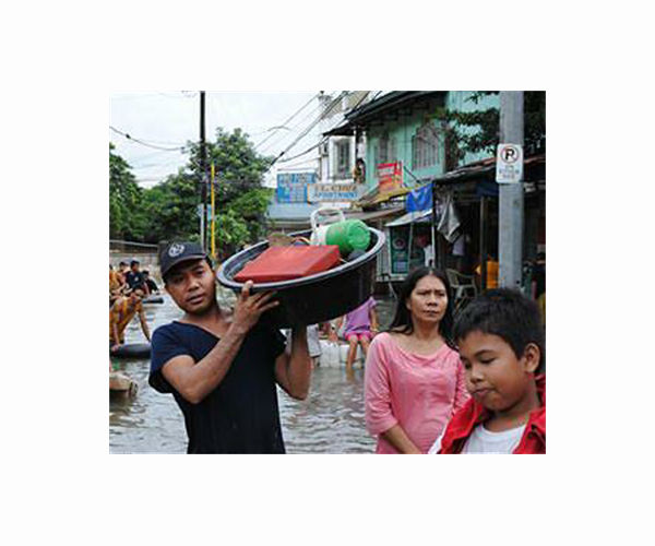 Philippines flooding displaces thousands, two missing