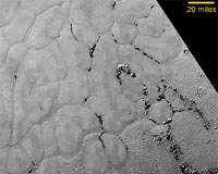 Mysterious icy plains glimpsed on Pluto's surface
