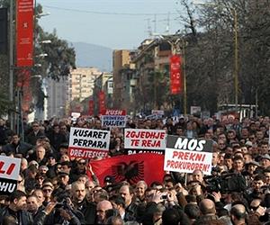 NATO urges Albania to peacefully solve crisis