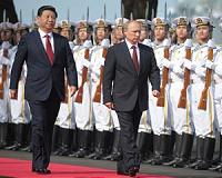 China ready to step up virus cooperation, Xi tells Putin