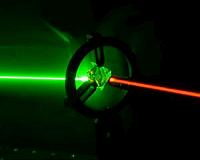 Changing the color of single photons in a diamond quantum memory