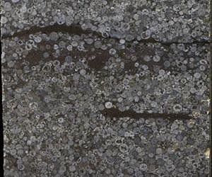 Splatters of molten rock signal period of intense asteroid impacts on Earth