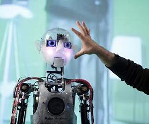 New brain-machine interface moves a paralyzed hand