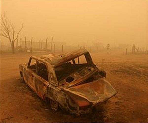 Greek firefighters begin to control forest fire near Athens