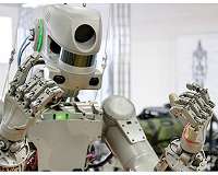 Russian humanoid robot boards space station after delay