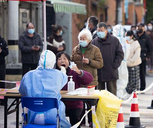 Swathes of Shanghai to be returned to lockdown in testing drive