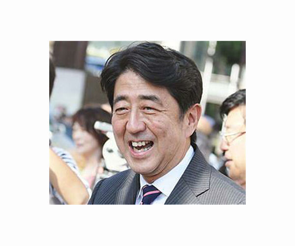 Japan's Abe urges stronger defences to face missiles