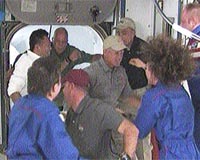 ISS, Discovery crews meet, get down to business