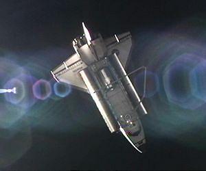 Shuttle Atlantis heads home from space station