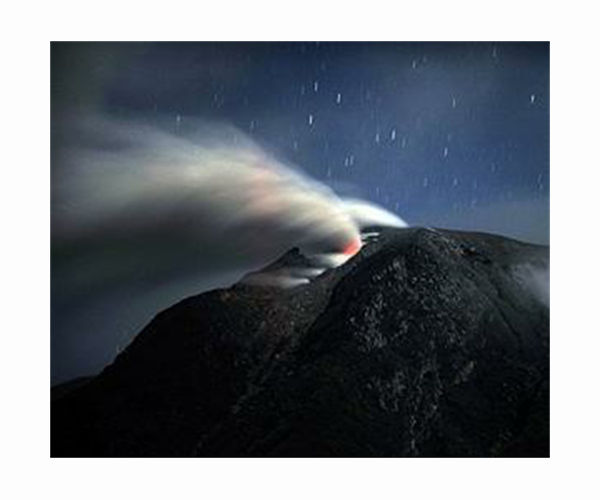 Indonesia's erupting Sinabung volcano belches column of ash