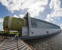 NASA Teams Load Artemis I Rocket Hardware on Barge for Trip to Kennedy