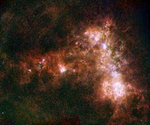 Herschel and Spitzer See Stardust In Nearby Galaxies