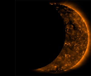 Hinode and SOHO paint an asymmetrical picture of the sun