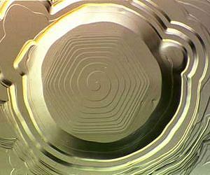Shaking down frozen helium: In a 'supersolid' state, it has liquid-like characteristics