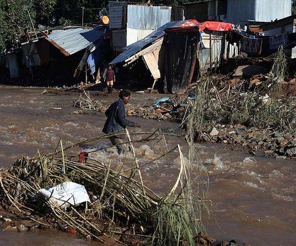 Homes 'swept away' in deadly S.Africa mine dam collapse