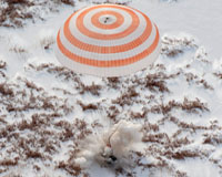 Astronauts return to Earth on Russian Soyuz spaceship