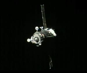 Soyuz Docks At Space Station Four Orbits After Launch