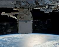 SpaceX's first recycled Dragon arrives at space station